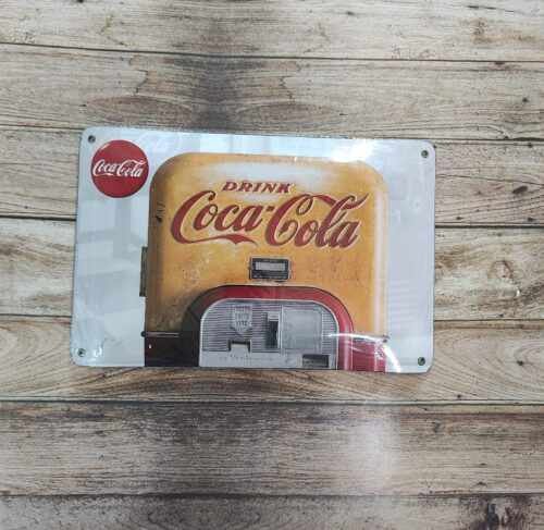 COCA COLA MITAD HELADERA